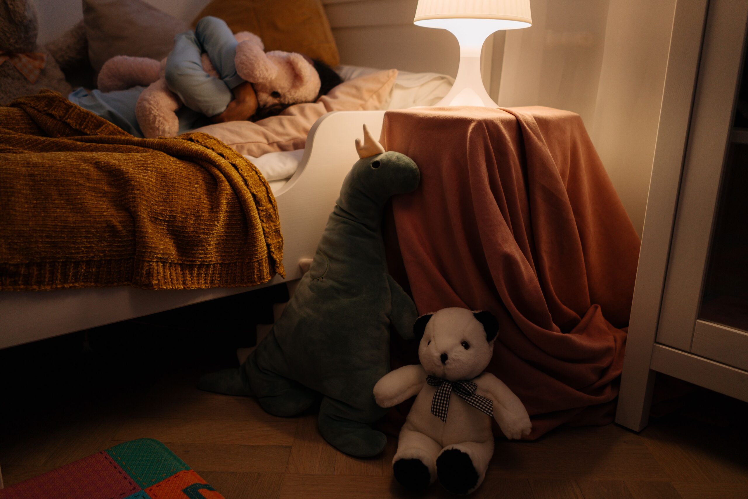 child sleeping soundly as part of a consistent family bedtime routine