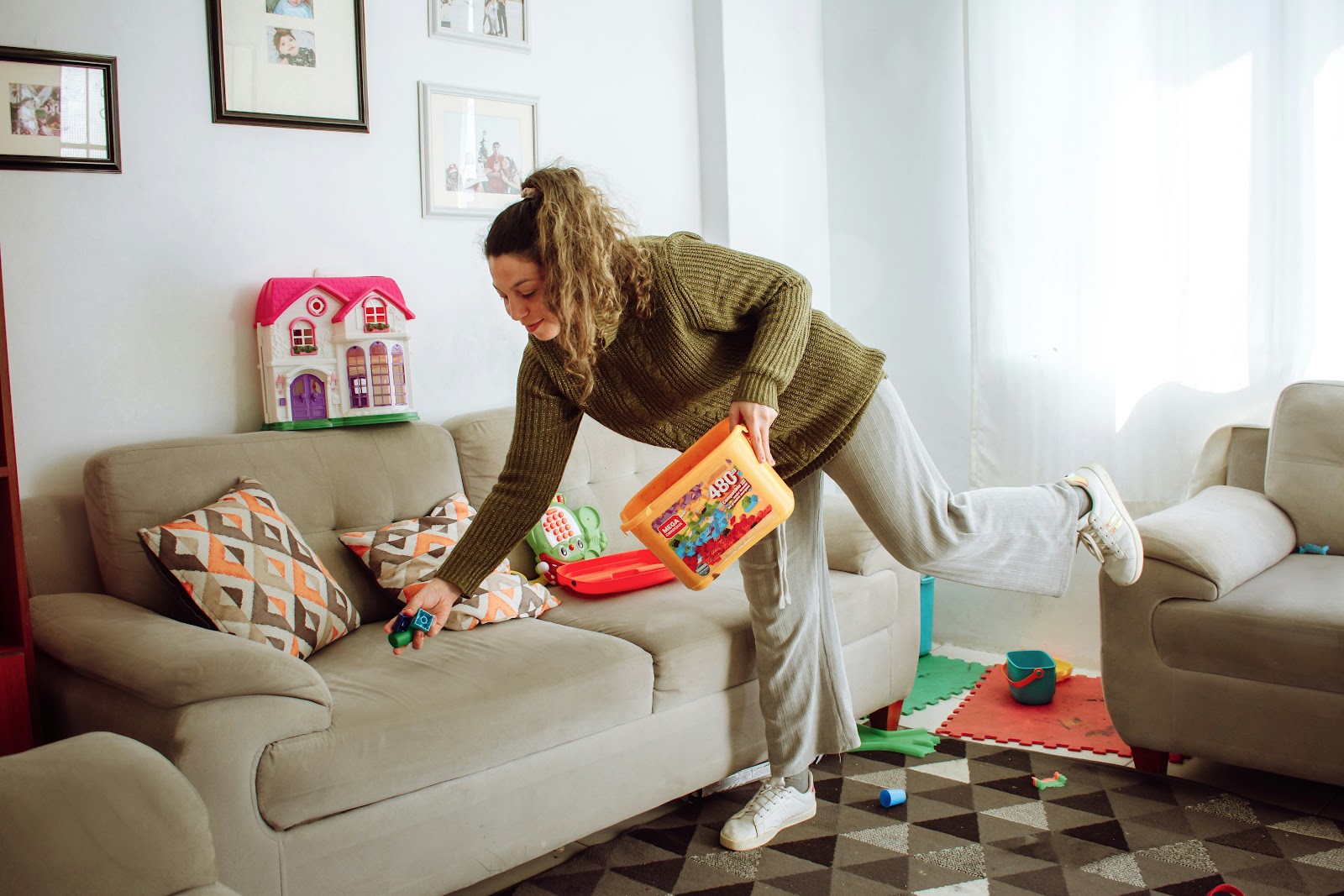 Flying mom clean living room Quick tidy of the couch and pillows during a flying mom clean before the week starts
