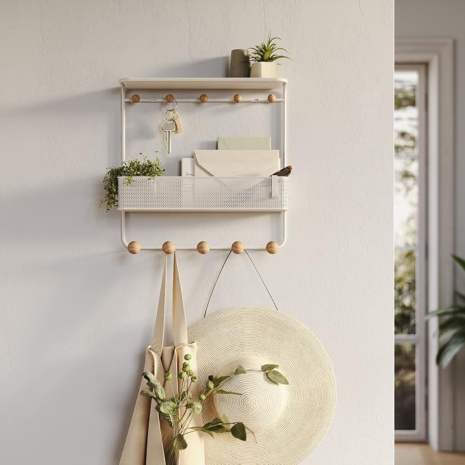Umbra Estique entryway organizer with hooks and shelf holding mail and keys