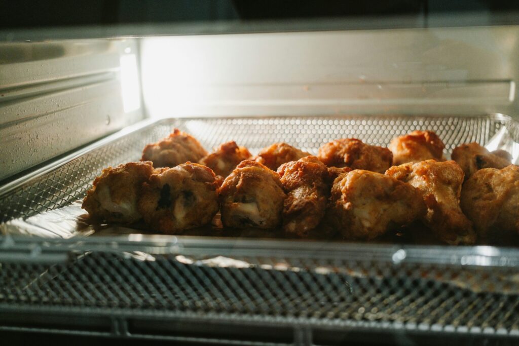 Countertop oven baking food on a tray