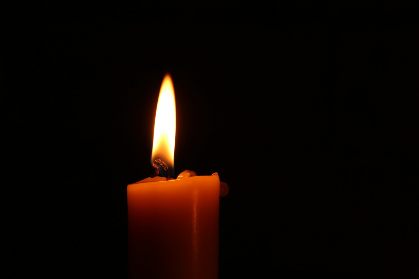 A lit candle up close