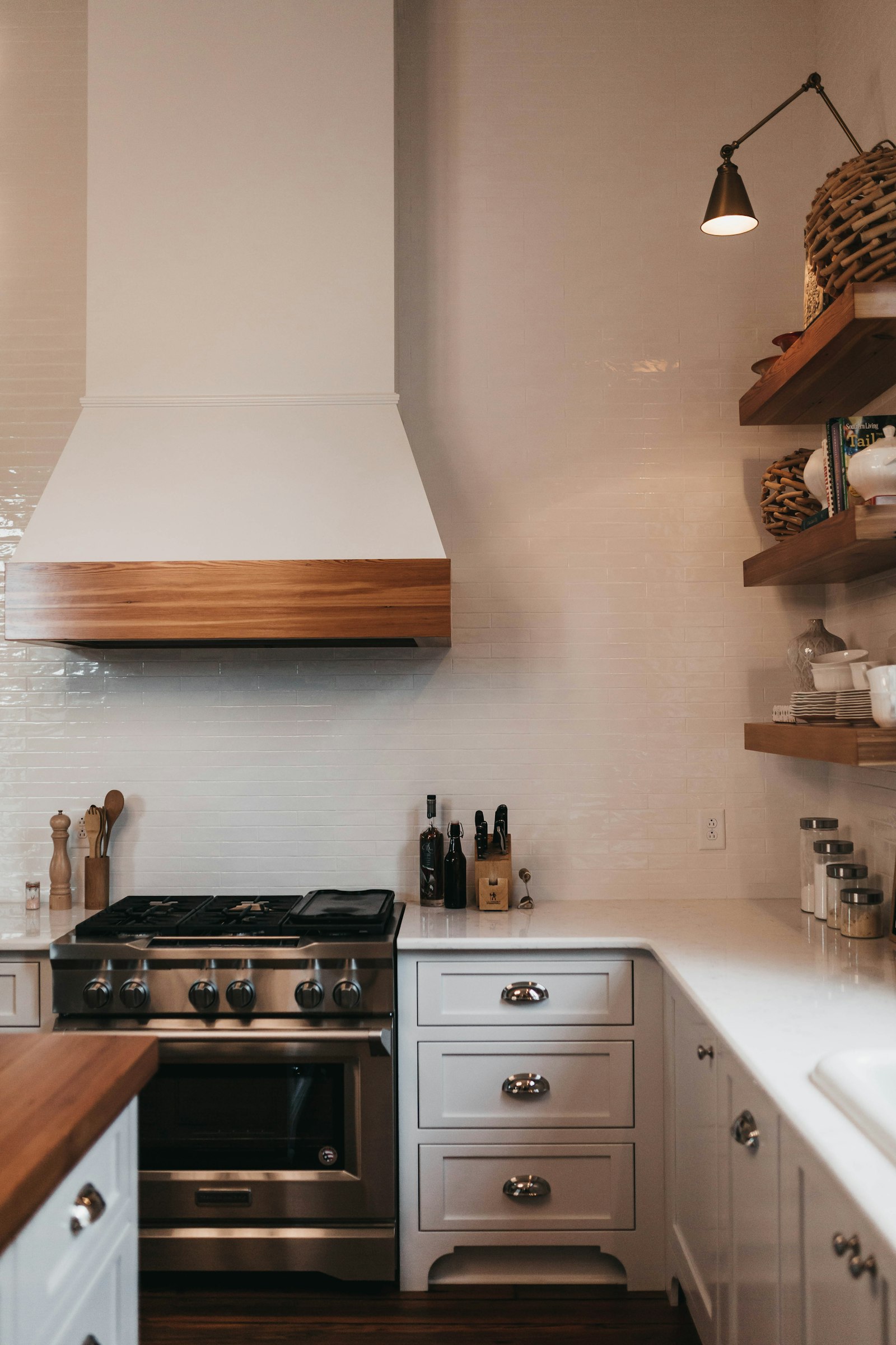 A clean, bright kitchen with simple cupboards