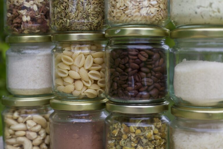 Assorted foods stored in clear glass jars
