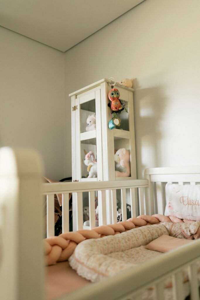 A nursery with a white crib