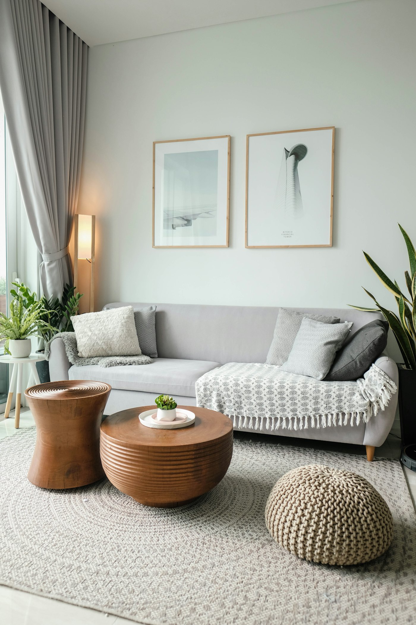 A living room with soft furnishings