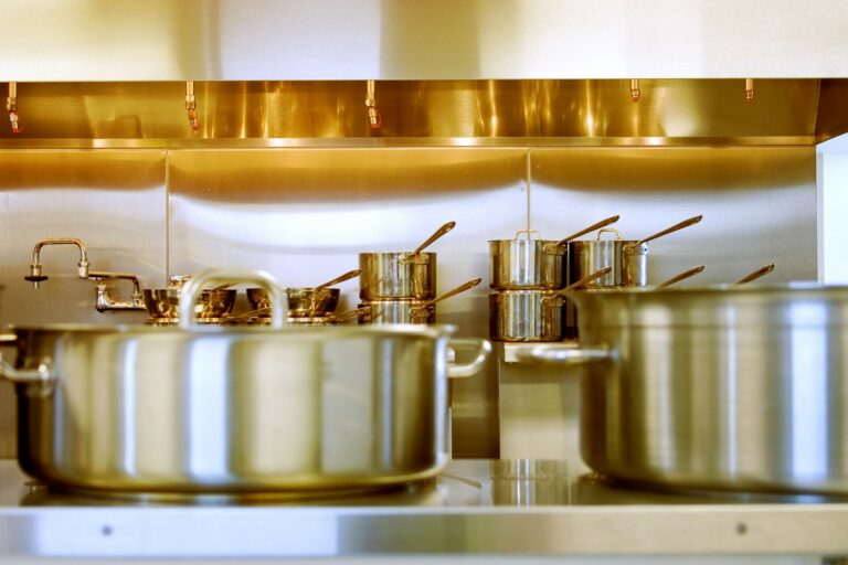 Stainless steel cookware set in a home kitchen